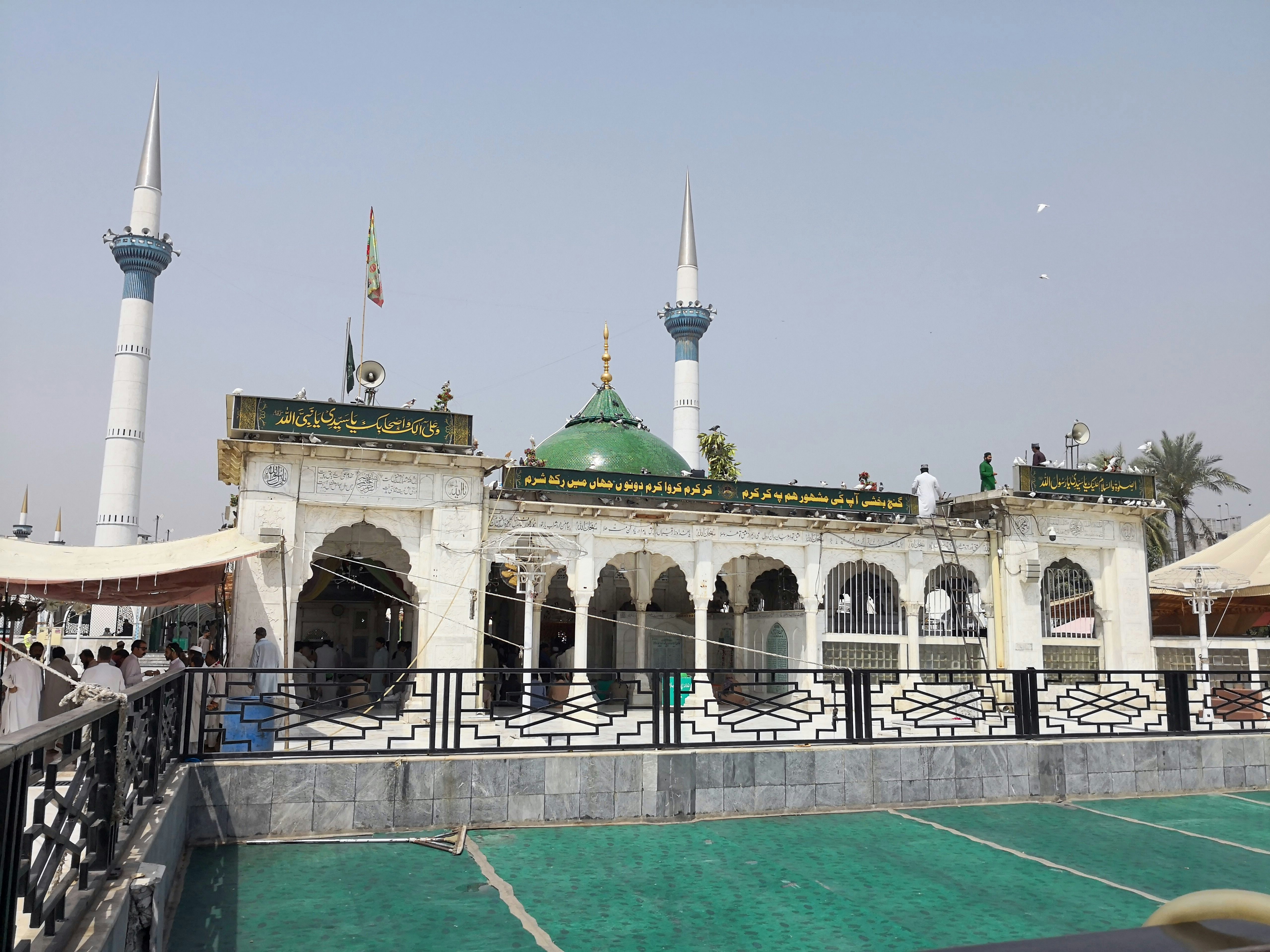 Pakistan, Lahore 30 May 2018; Data Darbar (Data Durbar) is the largest Sufi shrine in South Asia, It was build to house of Muslim mystic, Abul Hassan Ali Hujwiri, Known as Data Ganj Baksh at Punjab.; Shutterstock ID 1147940222; your: Bridget Brown; gl: 65050; netsuite: Online Editorial; full: POI Image Update